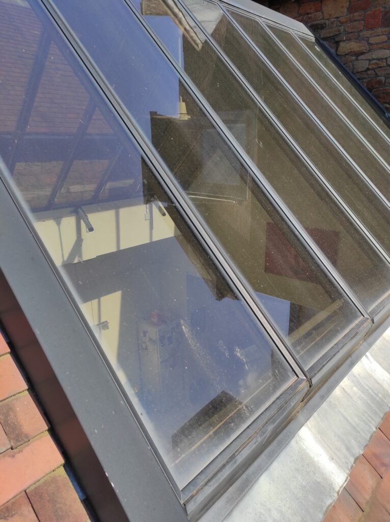 Sloping glass canopy
